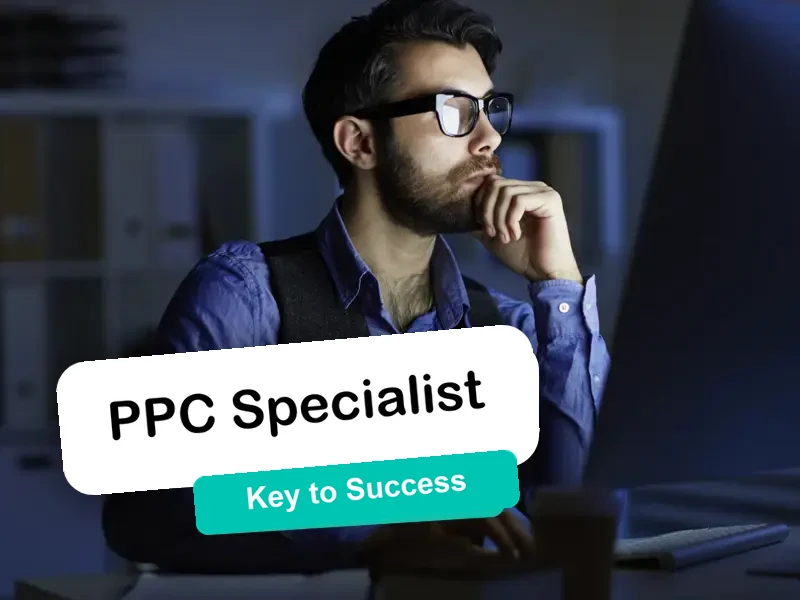 PPC specialist at a monitor with a campaign and ROI overview